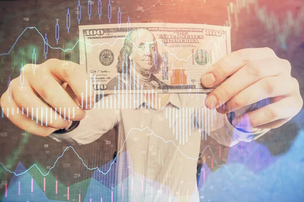Multi exposición de gráfico de divisas dibujo holograma y EE.UU. billetes de dólares y las manos del hombre. Concepto de análisis técnico . — Foto de Stock