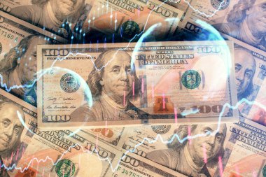 Forx grafiğinin çok sayıda görüntüsü bize dolar banknotları arka planında görünüyor. Finansal başarı piyasası kavramı.