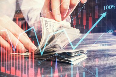 Forx grafiği, hologram, Amerikan dolarları ve insan eli çizimleri. Teknik Analiz kavramı.