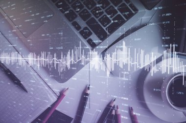 Bilgisayarla arka plan üzerine iki kat mali şema çizimi. Araştırma ve analiz kavramı. Üst görünüm.