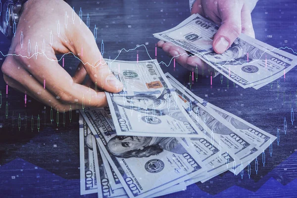 Multi exponering av finansiella diagram rita hologram och USA dollar räkningar och manshänder. Analyskoncept. — Stockfoto