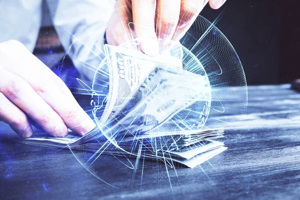 Multi blootstelling van financiële thema tekenen hologram en Amerikaanse dollars biljetten en mannenhanden. Bedrijfsconcept. — Stockfoto