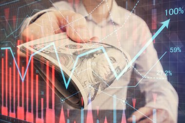 Finansal grafiğe çoklu pozlama hologram, Amerikan dolarları ve insan eli. Analiz kavramı.