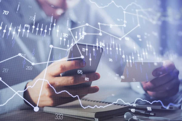 Dubbel exponering av män händer som håller och använder en telefon och finansiella diagram ritning. Analyskoncept. — Stockfoto