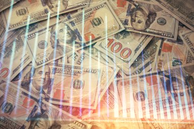 Forx grafiğinin çok sayıda görüntüsü bize dolar banknotları arka planında görünüyor. Finansal başarı piyasası kavramı.