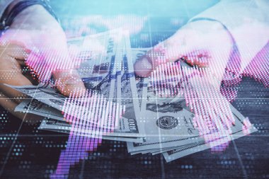 Finansal temaya çok fazla maruz kalma hologram, Amerikan dolarları ve erkek eli. İş konsepti.