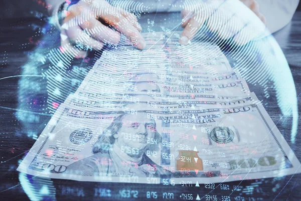 Multi exposición de tema financiero dibujo holograma y EE.UU. billetes de dólares y las manos del hombre. Concepto empresarial. —  Fotos de Stock