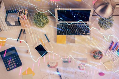 Bilgisayarla ön plan arkaplanını çizerken çift pozlama. Finansal araştırma ve analiz kavramı. Üst görünüm.