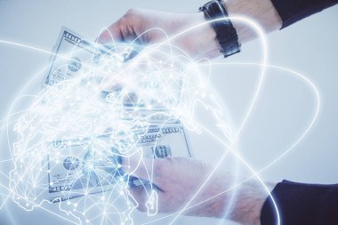 Finansal temaya çok fazla maruz kalma hologram, Amerikan dolarları ve erkek eli. İş konsepti.
