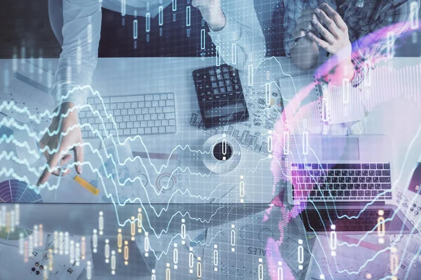 Double exposure of man and woman working together and financial graph hologram drawing. market analysis concept. Computer background. Top View. — Stock Photo, Image