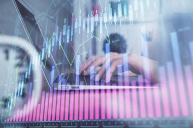 Bilgisayarda ve ön x grafik hologram çiziminde kadın eli yazarken çift pozlama. Borsa yatırım kavramı.