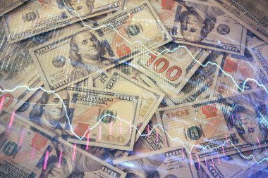 Forx grafiğinin çok sayıda görüntüsü bize dolar banknotları arka planında görünüyor. Finansal başarı piyasası kavramı.