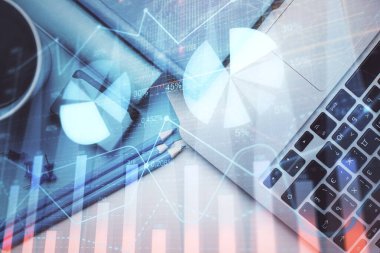 Bilgisayarla masaüstü arkaplanı üzerinde ön x grafik çizimi çift pozlama. Finansal analiz kavramı. Üst görünüm.