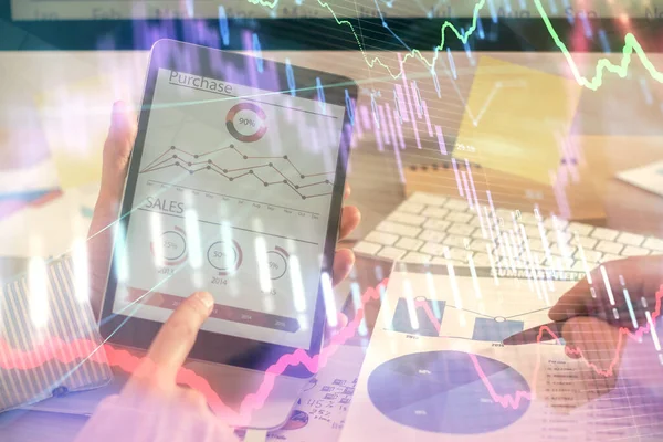 stock image Multi exposure of mans hands holding and using a phone and financial chart drawing. Market analysis concept.