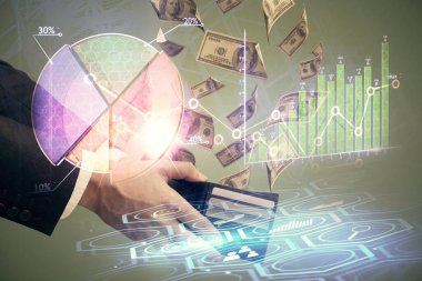 Finansal grafiğe çoklu pozlama hologram, Amerikan dolarları ve insan eli. Analiz kavramı.