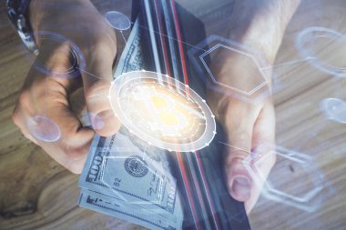 Hologram, Amerikan dolarları ve erkek eli gibi çok sayıda engelleme temasına maruz kalma. İş konsepti.
