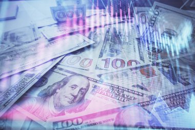 Forx grafiğinin çok sayıda görüntüsü bize dolar banknotları arka planında görünüyor. Finansal başarı piyasası kavramı.