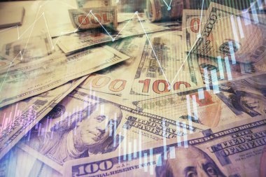 Forx grafiğinin çok sayıda görüntüsü bize dolar banknotları arka planında görünüyor. Finansal başarı piyasası kavramı.