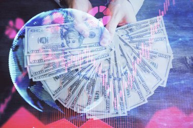 Finansal temaya çok fazla maruz kalma hologram, Amerikan dolarları ve erkek eli. İş konsepti.