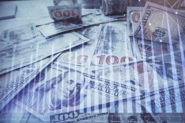 Forx grafiğinin çok sayıda görüntüsü bize dolar banknotları arka planında görünüyor. Finansal başarı piyasası kavramı.