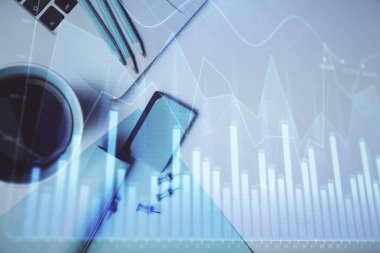 Bilgisayarla masaüstü arkaplanı üzerinde ön x grafik çizimi çift pozlama. Finansal analiz kavramı. Üst görünüm.