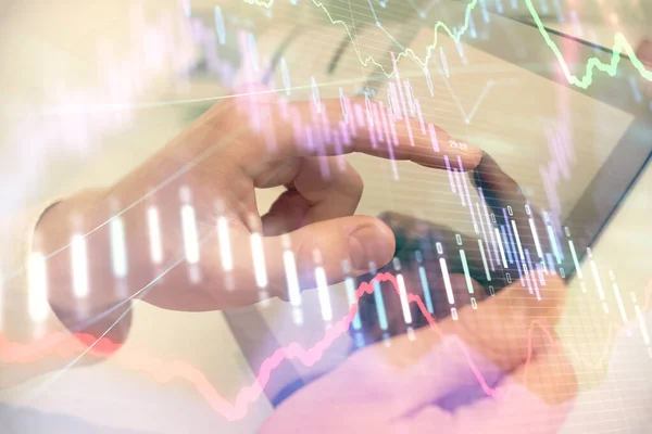 Multi exposure of mans hands holding and using a phone and financial chart drawing. Market analysis concept.