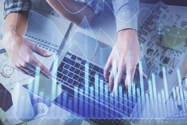 Double exposure of man and woman working together and forex graph hologram drawing. Financial analysis concept. Computer background. Top View. — Stock Photo, Image