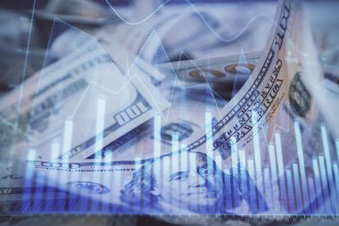 Önx grafiğinin arka plandaki dolarları iki katına çıkarması. Finans piyasası kavramı.