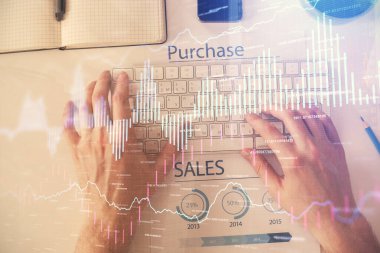 Dizüstü bilgisayar klavyesini ve ön x çizim hologramını yazarken çift pozlama. Üst Manzara. Finans piyasası kavramı.