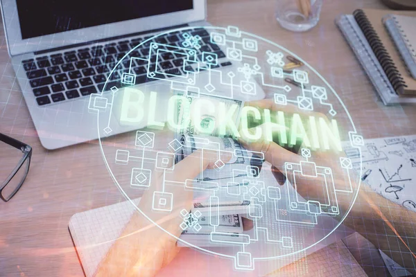 Multi exposure of blockchain theme drawing hologram and USA dollars bills and man hands. Business concept. — Stock Photo, Image