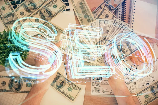 Hologram çizen seonun çoklu pozu ve bize dolar banknotları ve insan eli.. — Stok fotoğraf