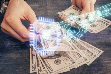 Teknolojinin iki katına çıkması hologram, dolar banknotları ve insan eli. Veri kavramı