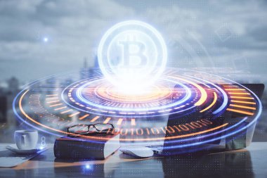 Blockchain temalı çizimler ve açık defter arkaplanı olan bir masa. Kripto para birimi kavramı