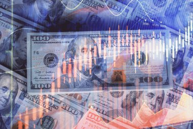 Forx grafiğinin çok sayıda görüntüsü bize dolar banknotları arka planında görünüyor. Finansal başarı piyasası kavramı.