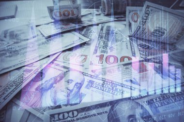 Forx grafiğinin çok sayıda görüntüsü bize dolar banknotları arka planında görünüyor. Finansal başarı piyasası kavramı.