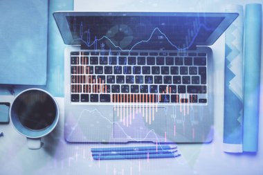 Bilgisayarla masaüstü arkaplanı üzerinde ön x grafik çizimi çift pozlama. Finansal analiz kavramı. Üst görünüm.