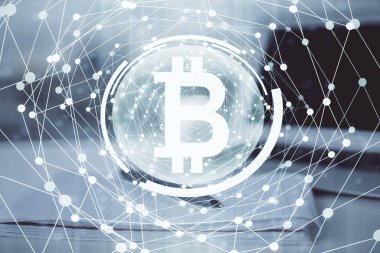 Blockchain temalı çizimler ve açık defter arkaplanı olan bir masa. Kripto para birimi kavramı