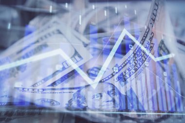 Önx grafiğinin arka plandaki dolarları iki katına çıkarması. Finans piyasası kavramı.