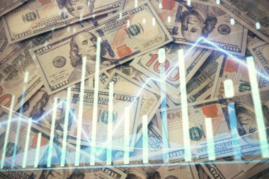 Forx grafiğinin çok sayıda görüntüsü bize dolar banknotları arka planında görünüyor. Finansal başarı piyasası kavramı.
