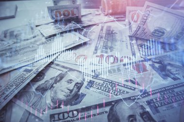 Forx grafiğinin çok sayıda görüntüsü bize dolar banknotları arka planında görünüyor. Finansal başarı piyasası kavramı.