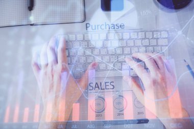 Dizüstü bilgisayar klavyesini ve ön x çizim hologramını yazarken çift pozlama. Üst Manzara. Finans piyasası kavramı.