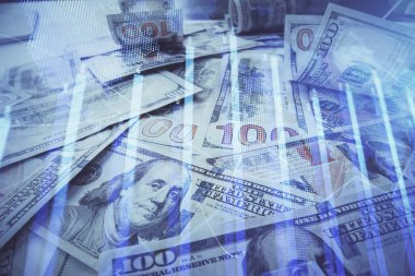 Forx grafiğinin çok sayıda görüntüsü bize dolar banknotları arka planında görünüyor. Finansal başarı piyasası kavramı.