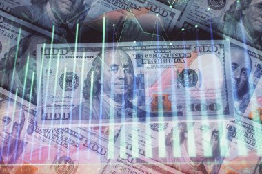Forx grafiğinin çok sayıda görüntüsü bize dolar banknotları arka planında görünüyor. Finansal başarı piyasası kavramı.