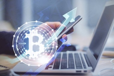 Erkeklerin el ele tutuşmalarının ve telefon ve kripto para birimi engelleme teması çiziminin iki kez görüntülenmesi.