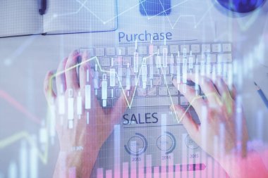 Dizüstü bilgisayar klavyesini ve ön x çizim hologramını yazarken çift pozlama. Üst Manzara. Finans piyasası kavramı.