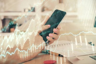 Bir adamın elini tutarken ve dijital bir cihaz ve ön grafik çizimi kullanırken çift pozlama. Finansal piyasa kavramı.