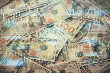 Forx grafiğinin çok sayıda görüntüsü bize dolar banknotları arka planında görünüyor. Finansal başarı piyasası kavramı.