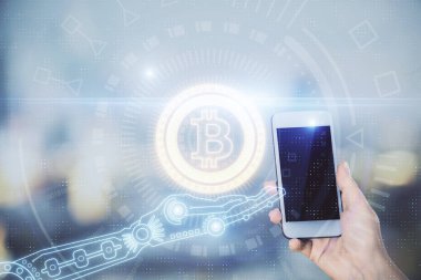 Hologram ve cep telefonu kullanan bir kadın tarafından iki kez görüntülenir..