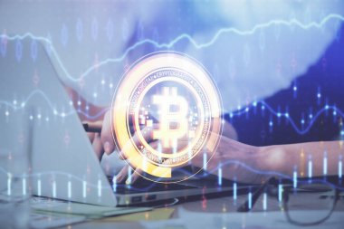 Bilgisayarda ve kripto piyasa temalı hologram çizimlerinde kadın elinin çifte pozu. Engelleme zinciri kavramı.