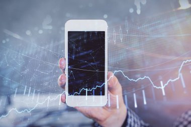 Erkeklerin el ele tutuşup dijital bir cihaz ve ön grafik çizimi kullanırken çift pozlama. Finansal piyasa kavramı.